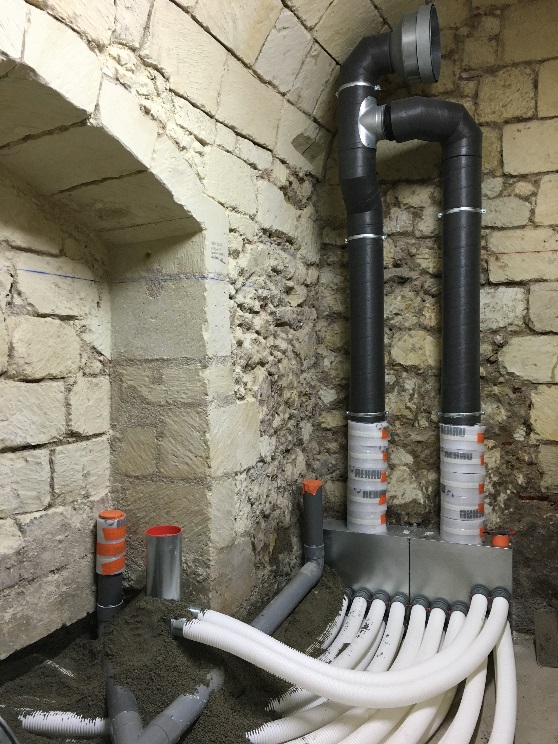 Passage conduits de ventilation